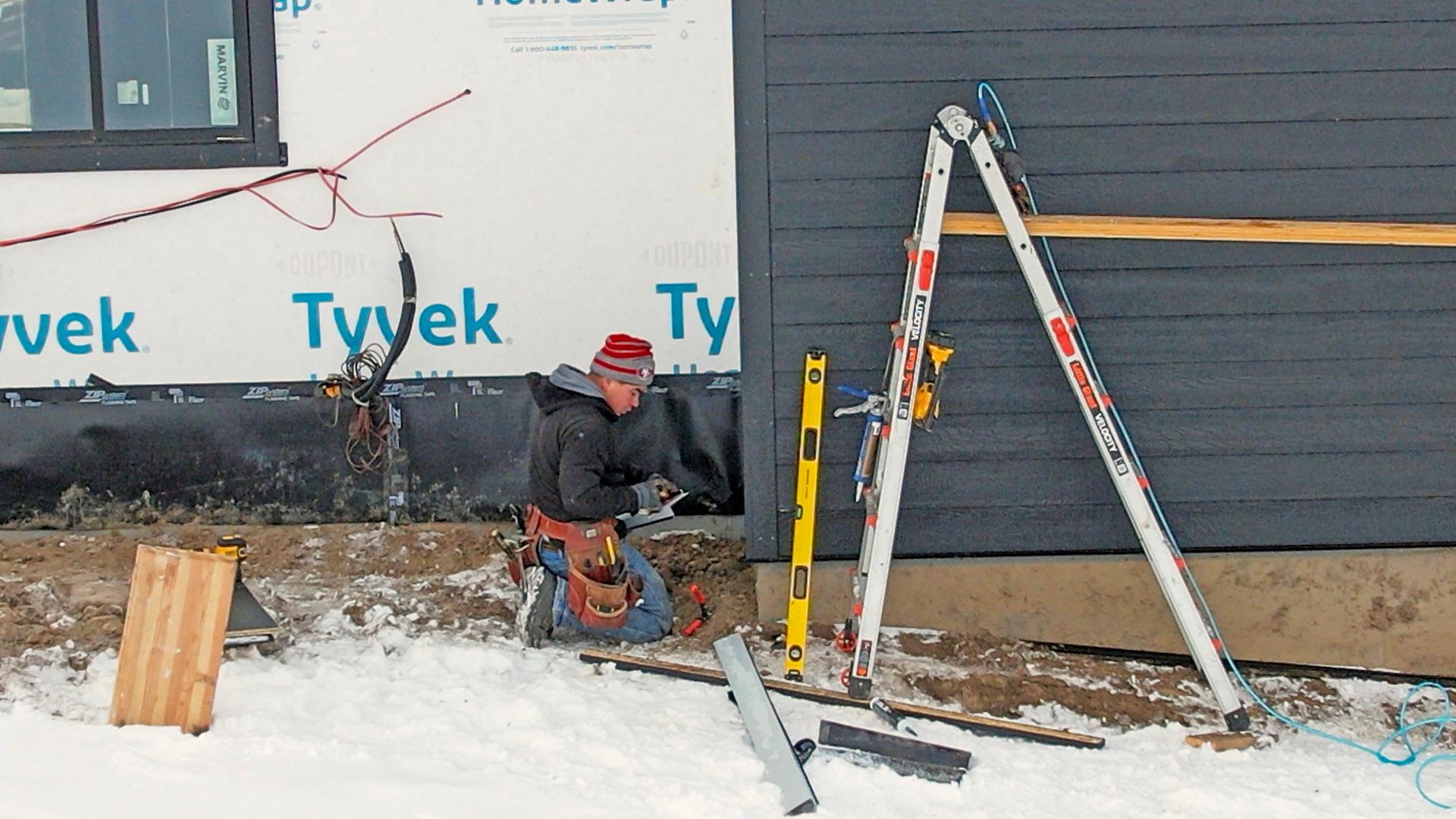 AquaBlock worker installing roofing in Bozeman, Montana